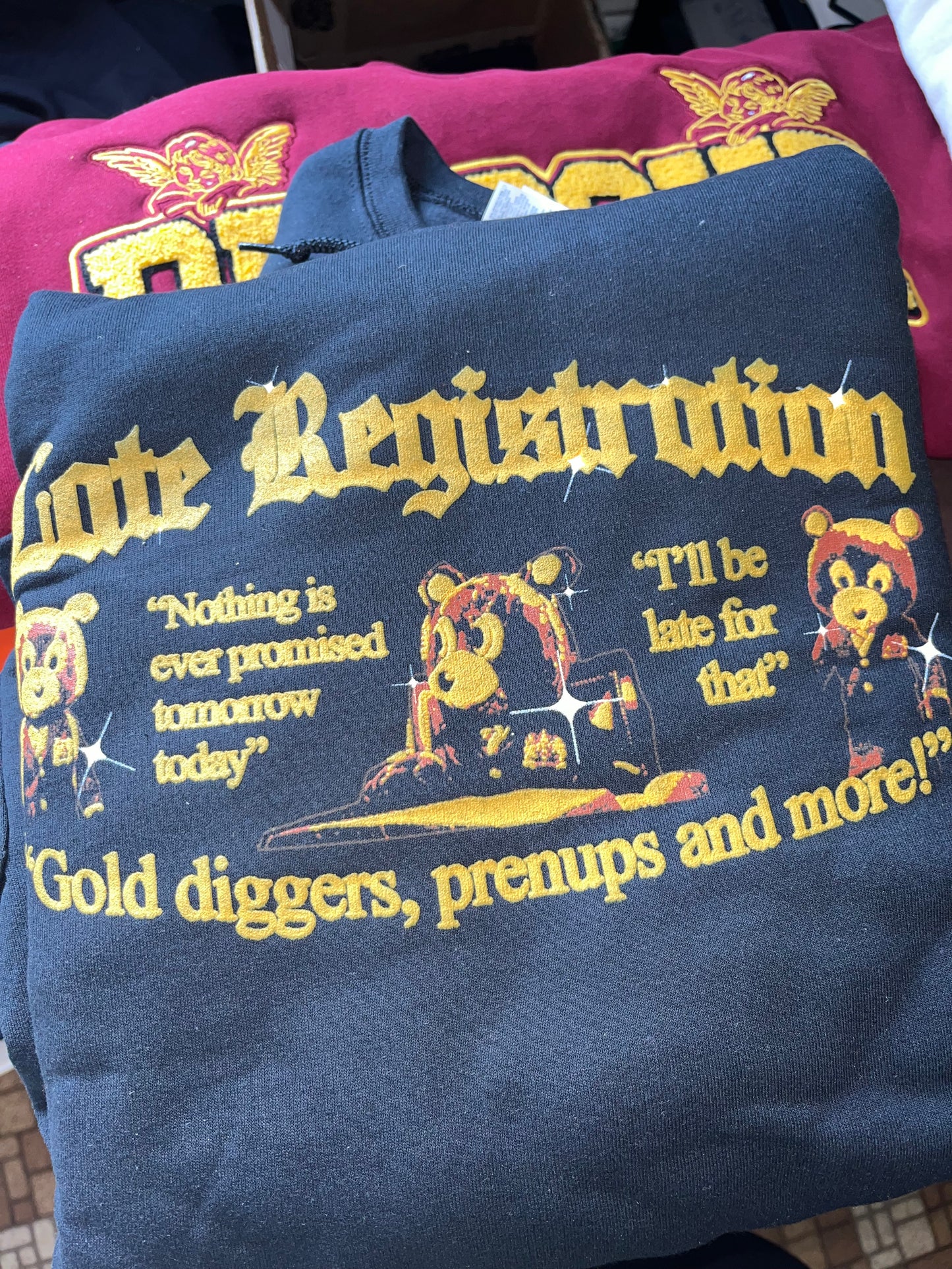 "REGISTRATION” 9oz PUFF PRINT HOODIE